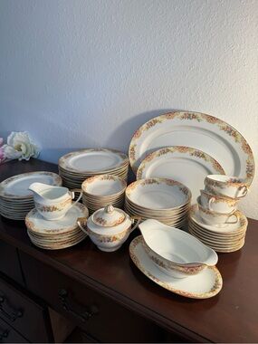 Noritake White Dinnerware Set with Gold Trim and Floral Border
